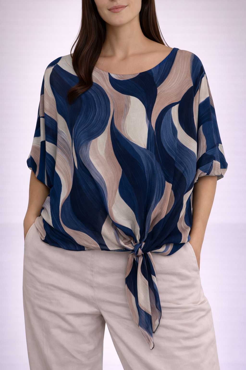 Blusa con stampa astratta e nodo frontale