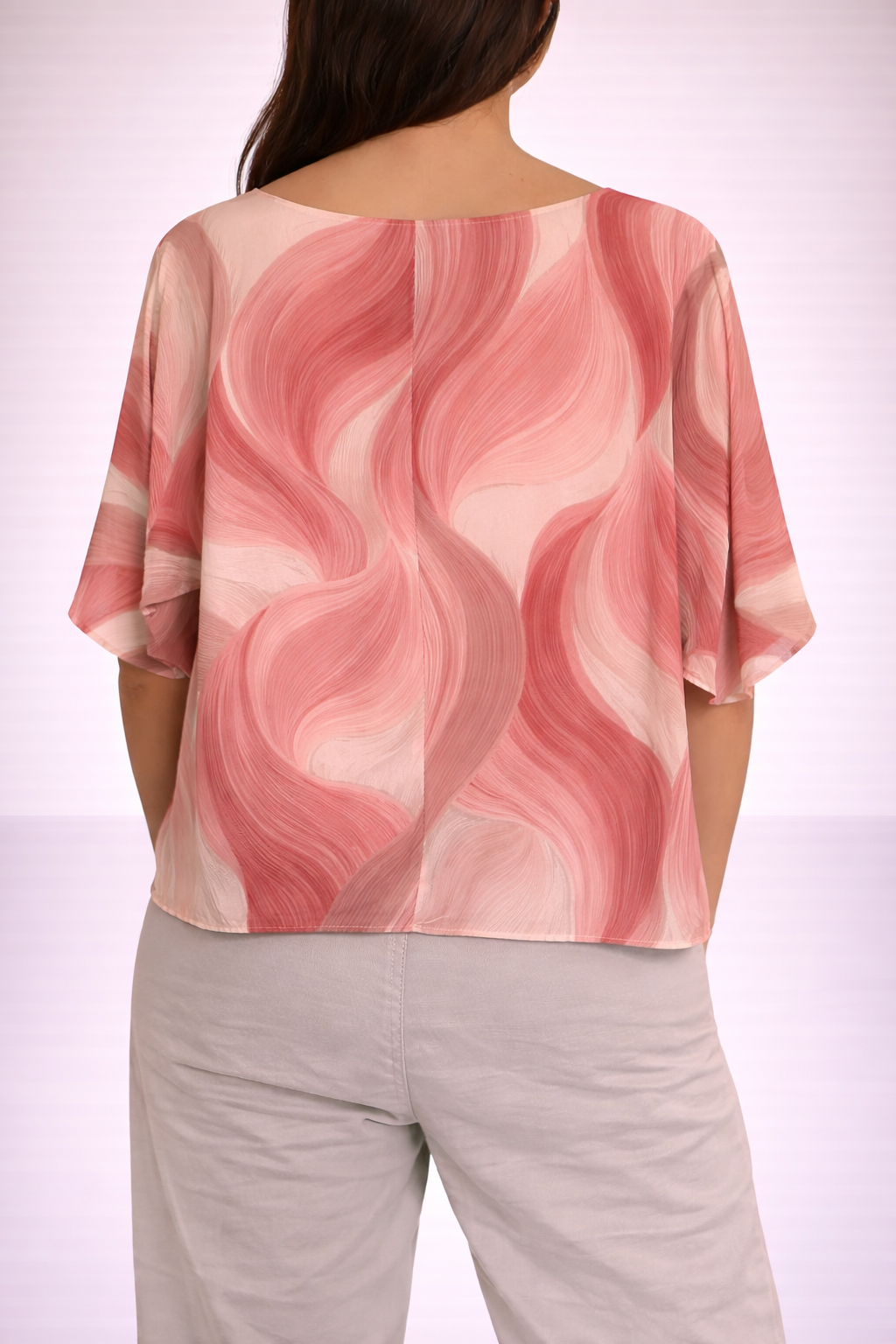 Blusa con stampa astratta e nodo frontale