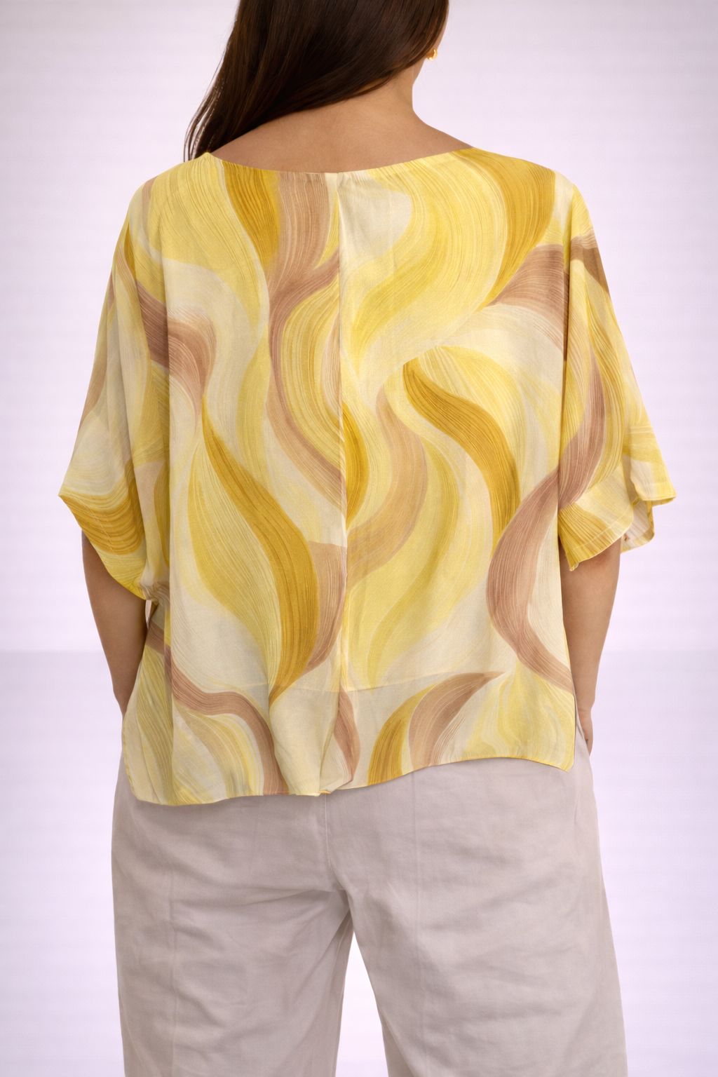 Blusa con stampa astratta e nodo frontale