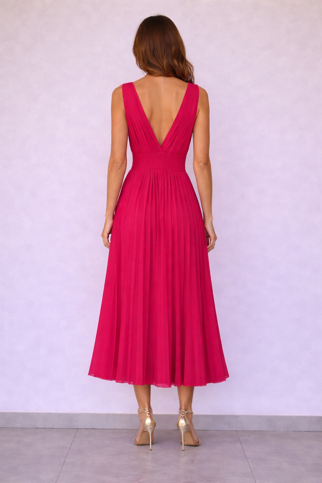 Abito lungo plissettato con scollo a V