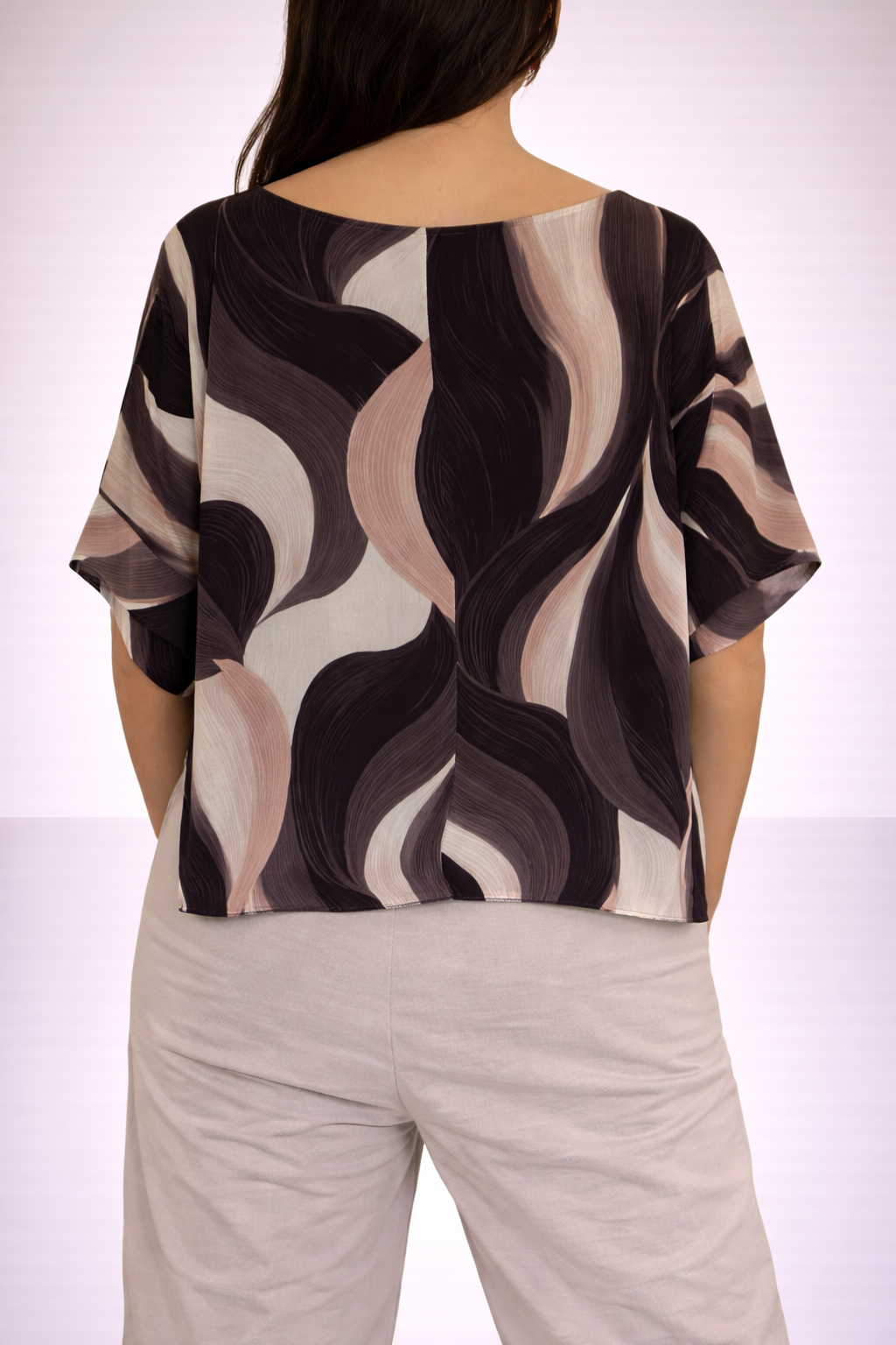 Blusa con stampa astratta e nodo frontale