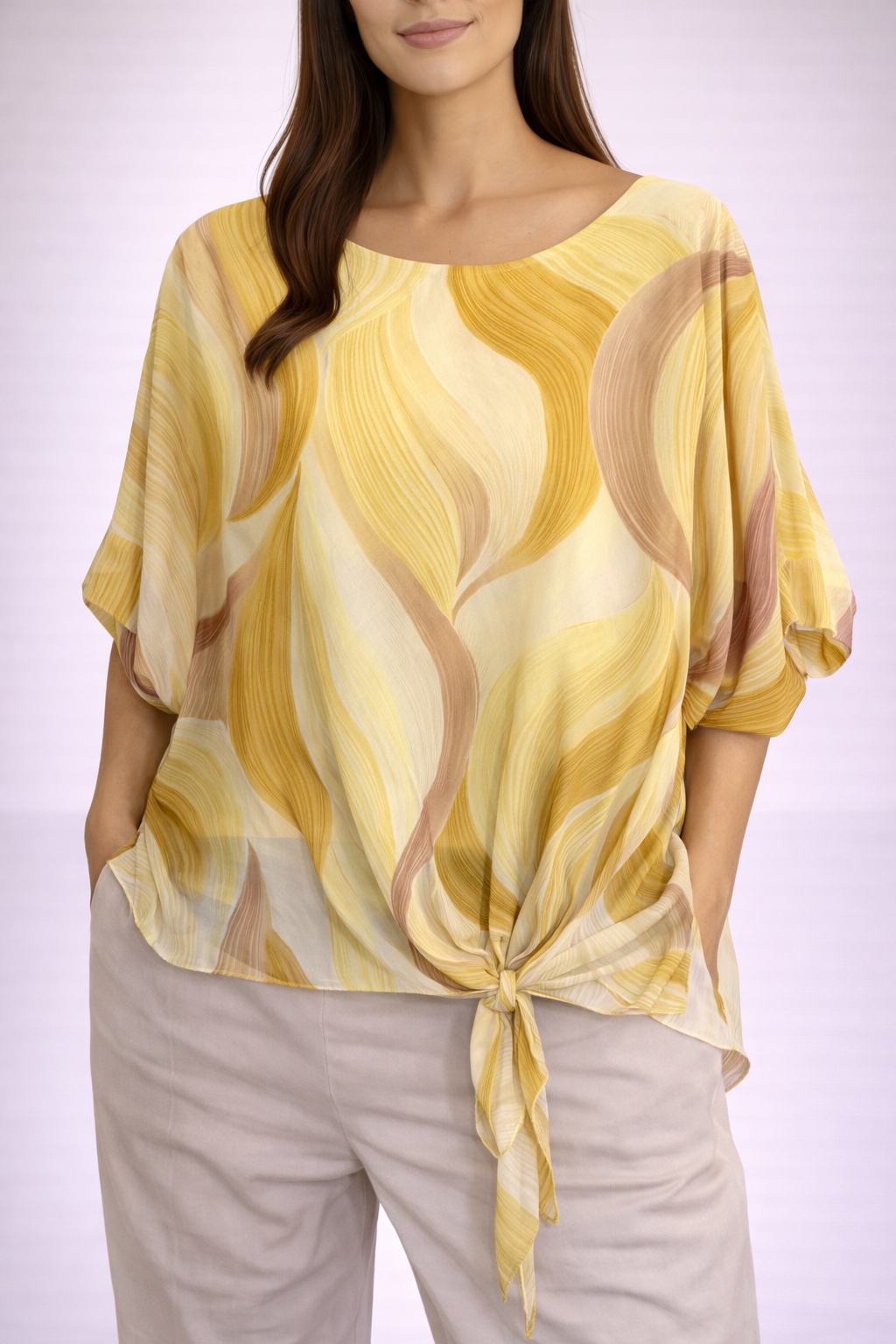 Blusa con stampa astratta e nodo frontale